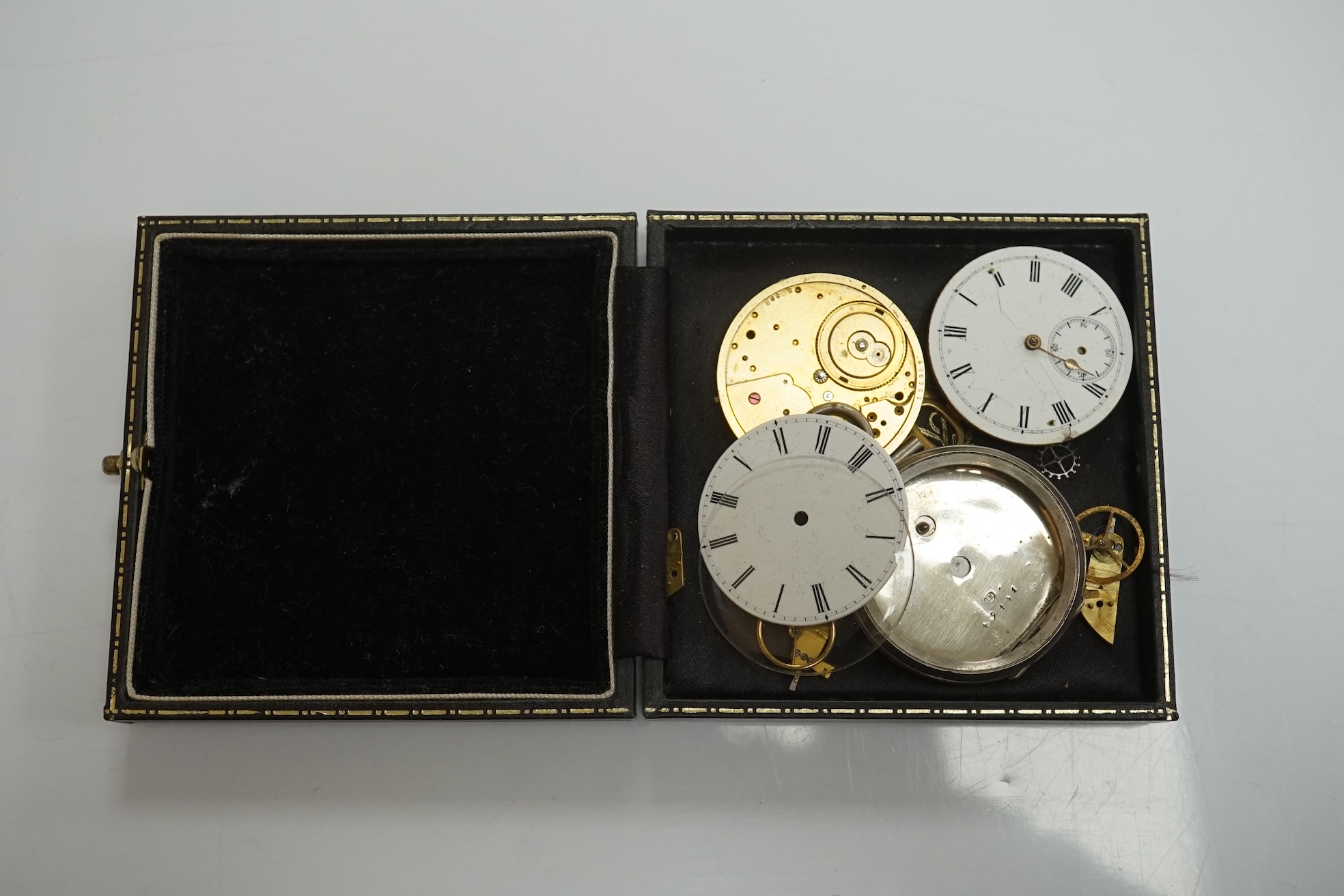 A collection of pocket watch cases (some silver), movements, dials and parts. Condition - poor